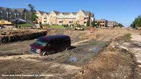 'Don't wind up like this:' Brown Deer police remind drivers of road closure after van gets stuck in mud