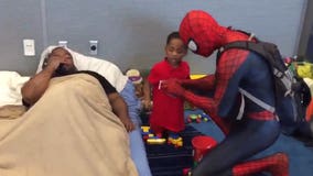 Spider-Man visits with Harvey victims at Houston shelter