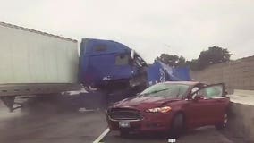 Caught on camera: Semi driver cited after crashing into tow truck near Mitchell Interchange