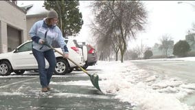 "It's heavy and it's wet:" Folks in Sheboygan dig out after late-season snowstorm