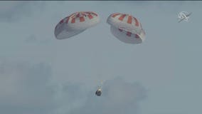 SpaceX crew capsule ends test flight with ocean splashdown