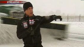 Reporter blasted with snow from snow plow while LIVE on air