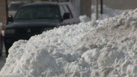 "It's all about the view:" Several inches of snow, tall piles make it difficult for drivers to see