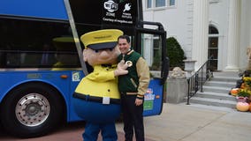 ‘The Big Cheese:' Governor Walker, Megabus officials unveil Wisconsin state bus