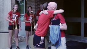 Reason to smile: UW Marching Band surprises cancer patient after her last chemo treatment