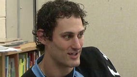 Admirals Mark Van Guilder spends time at schools, reading to children