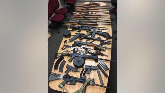 Two men arrested as about 35 firearms, thousands of rounds of ammunition seized from home