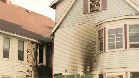"I had to help:" Woman races into burning home to rescue neighbors; 19 displaced after 2-alarm blaze