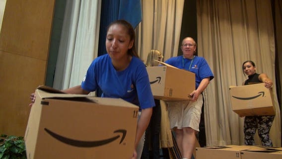 "Awesome for Amazon to do this:" Special delivery at school in Kenosha; boxes filled with supplies!