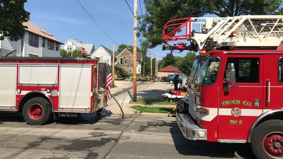 Firefighters battle fully-engulfed garage fire near 24th and Juneau