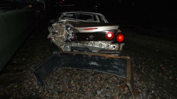 Freight train strikes car on tracks in Waukesha