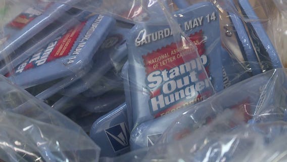 Letter carriers work overtime on their day off, gearing up for "Stamp Out Hunger" food drive