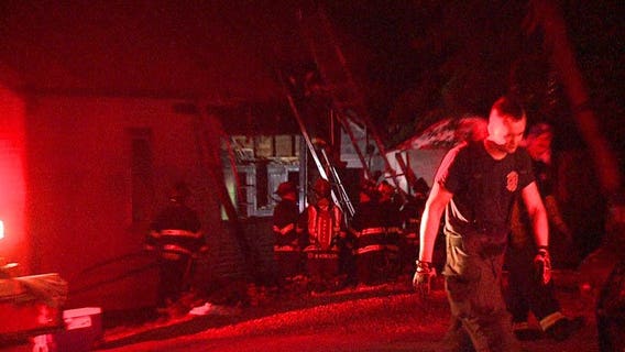 Fire officials respond to house fire near 11th and Keefe