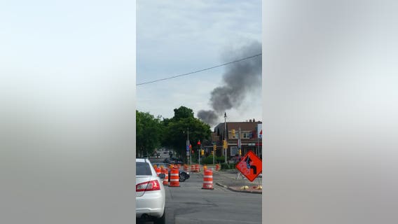 Developing: Firefighters battling fully-involved garage fire; smoke seen from I-43