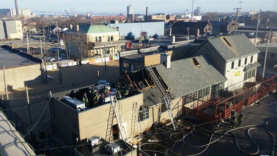 Fire breaks out at Ashley's Que in Walker's Point; "Tried throwing water and everything"