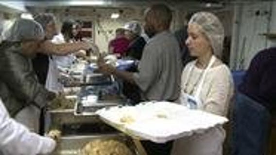 Church organizations provide Thanksgiving outreach meal