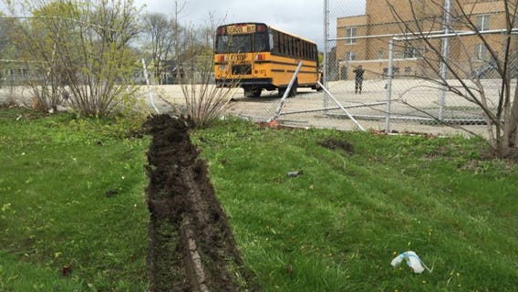 MFD: School bus carrying children smashes through fence near 36th and Rohr