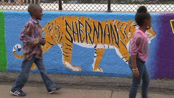 Students show off giant mural at Sherman Arts School