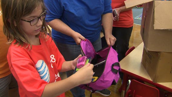 More than 750 students at 5 Milwaukee schools received new backpacks filled with supplies