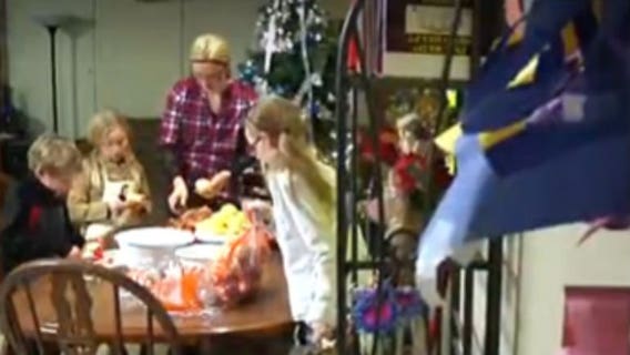 Family goes on pie-baking blitz to thank police who rallied to their aid after Christmas gifts stolen