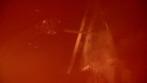 2-alarm fire inside vacant home leaves 6 displaced from neighboring residence