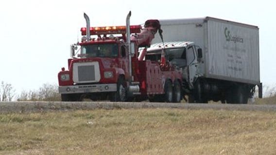 Man, dog killed in collision between SUV & semi