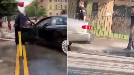 'Reprehensible:' Disturbing videos show men dumping buckets of water on NYPD officers