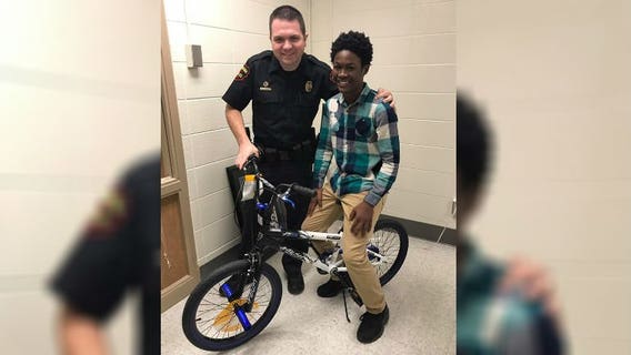 Kenosha police, Lance Middle School staff surprise young man with new bike after his was stolen