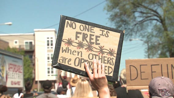 During march, petition circulated to cut MPD funding by 10%, invest in black communities