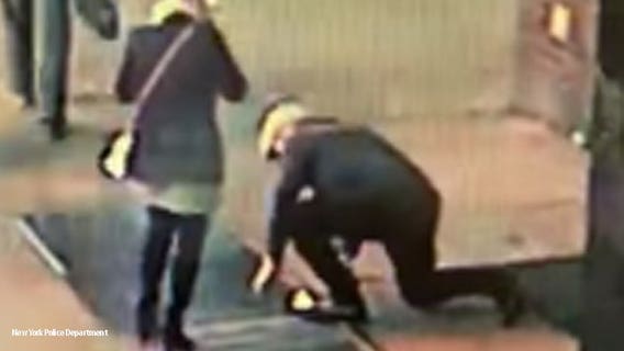 'Wanted for dropping his fiancee's ring!' NYPD seeks couple after it fell through grate during proposal