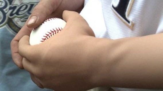 Man with bionic arm throws out first pitch at Brewers game