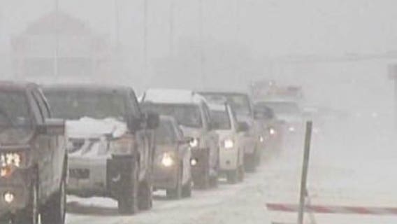 Blizzard batters heartland, spreads snowy mess to Midwest