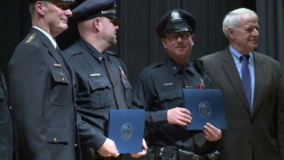 "That's what you do:" Officers who saved 9 from house fire among the honored at MPD Merit Awards