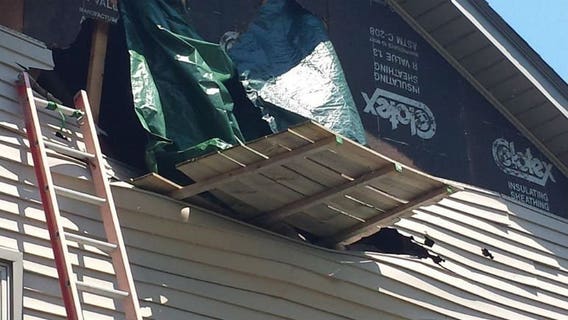 "We think that's a sign:" Kenosha home has major wind damage but one item remains untouched