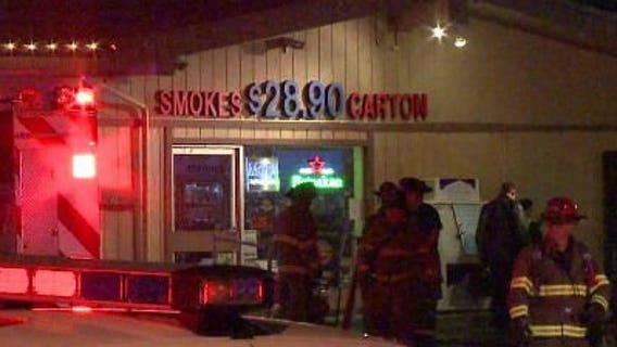 Police investigate liquor and tobacco shop fire