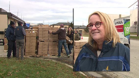 Just in time for Thanksgiving, volunteers fill holiday food boxes for 500 local families