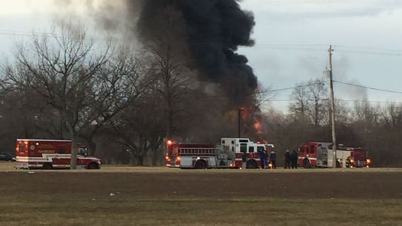 "It just went 'kaboom!'" Exploding propane tanks ignite large fire at business on Milwaukee's south side