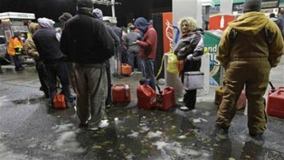 Gas rationing begins in NY; power outages persist