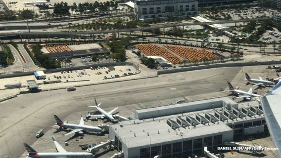 Police shoot armed man at Miami airport amid Irma evacuation
