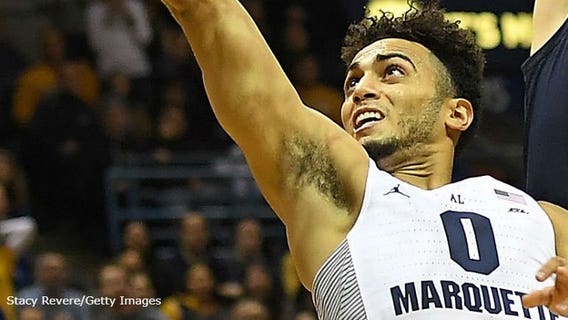 Howard scores 40, Marquette beats Davidson 73-63.