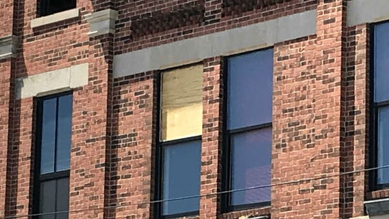 Police: Driver, passenger struck by gunfire in Milwaukee, fire station hit by bullets