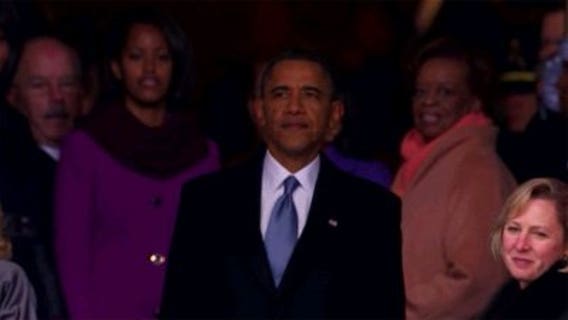 Sworn in again, Pres. Obama lingers for last look