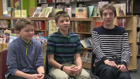 Middle school students create "Messages of Hope" for military children without a parent over the holidays