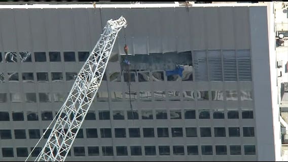 10 injured after piece of mechanical equipment being lifted by crane broke free in Manhattan