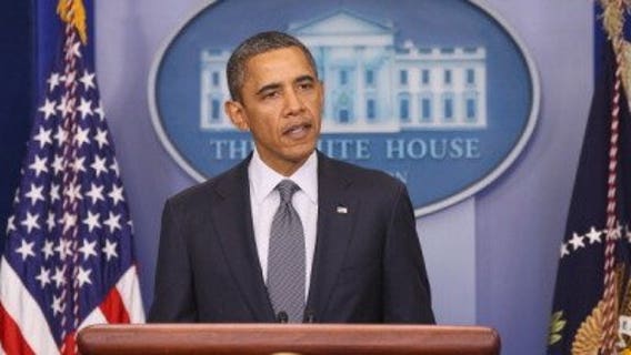 Military officials condemn photos of soldiers posing with body parts