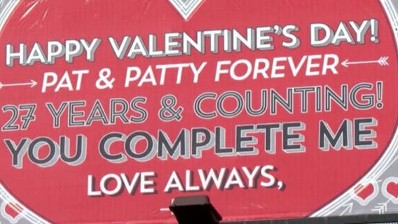 Man surprises wife of 27 years with Valentine's Day billboard: "She just totally lost it"