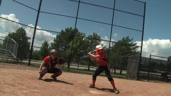Maddy Faller travels all over the country playing softball