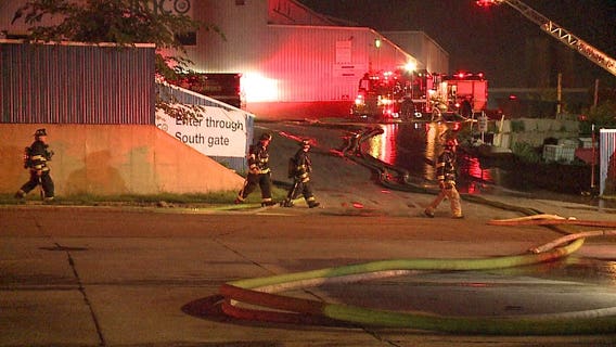 Firefighters respond to 3-alarm fire at recycling facility, 1 injured