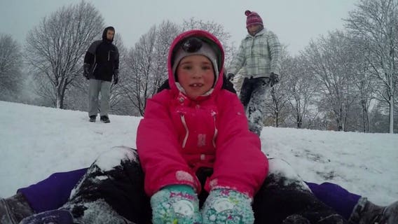 Folks enjoy a day in the snow, while others wish they stayed indoors