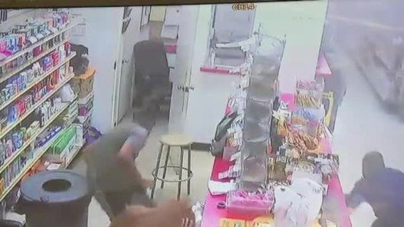 Terrifying video shows bullets flying during attempted robbery at store; employees, customers scrambling